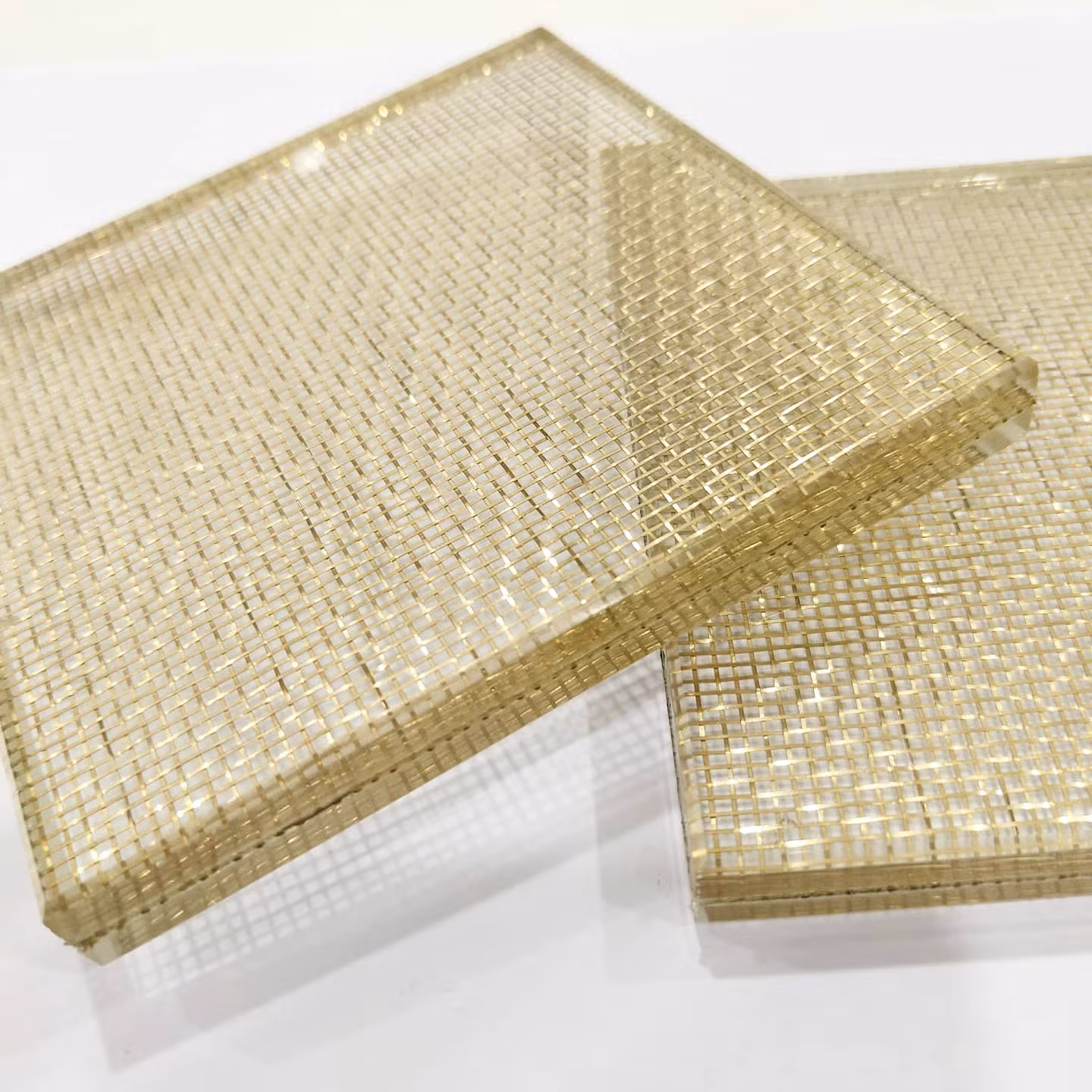fabric mesh laminated glass, fabric mesh lamination services, decorative fabric mesh lamination, fabric mesh lamination for glass, fabric mesh laminated glass solutions