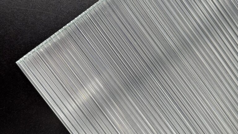 fabric mesh laminated glass, fabric mesh lamination services, decorative fabric mesh lamination, fabric mesh lamination for glass, fabric mesh laminated glass solutions