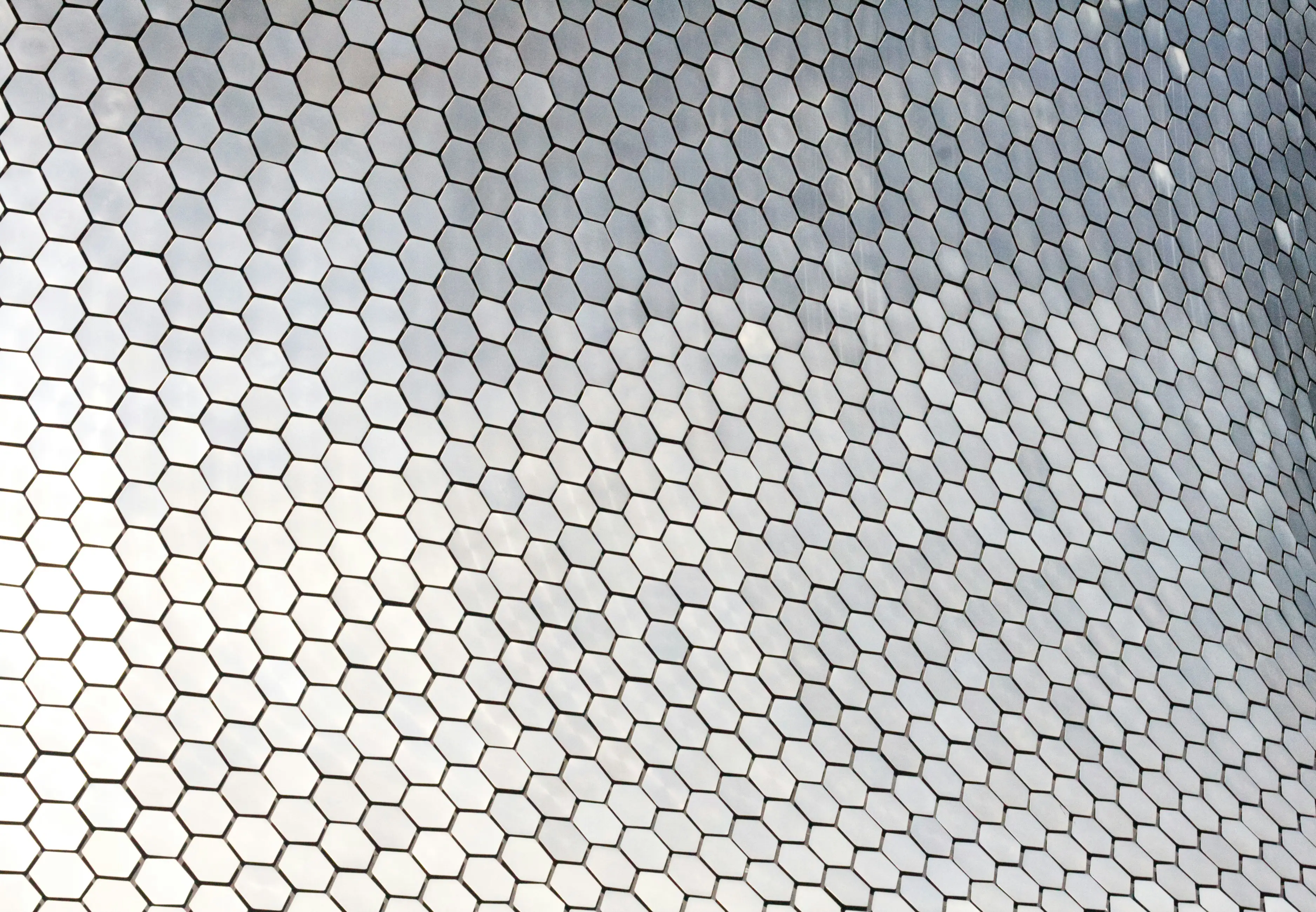 metal mesh lamination, metal mesh glass, metal mesh laminated glass, laminated glass metal mesh, metal mesh lamination services